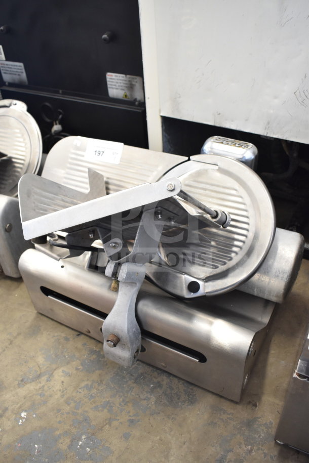 Globe 500 Commercial Countertop Meat Slicer with blade sharpener, 115 volts, 1 phase; visible metal construction, good condition.