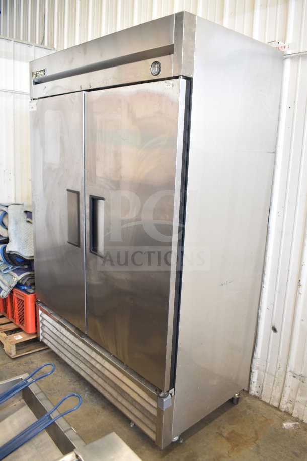 True T-49F Commercial 2 Door Reach In Freezer on casters, stainless steel, 115V, 1 phase, excellent condition.