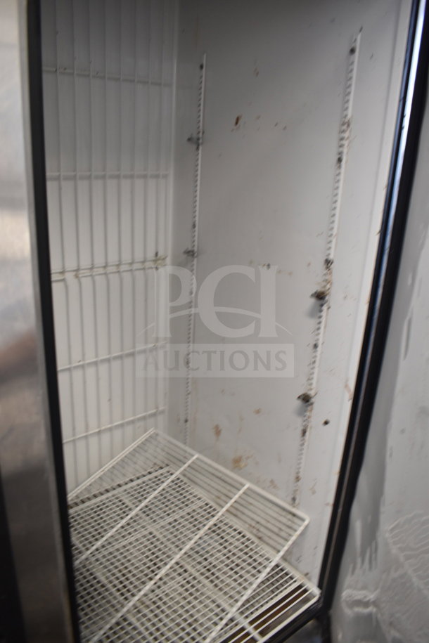 True T-49F commercial 2-door reach-in freezer with spacious interior. Includes commercial casters and 115V, 1-phase power.