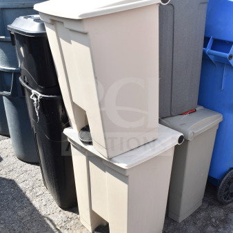 Six assorted trash cans in various colors and conditions, featuring lids and pedal mechanisms, suitable for outdoor use.