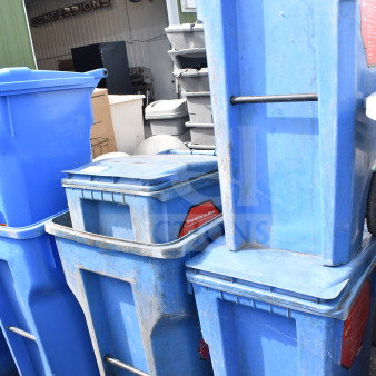 Four blue poly trash cans, weathered condition, visible "Know before you throw" labels. Auction item multiplier applies.