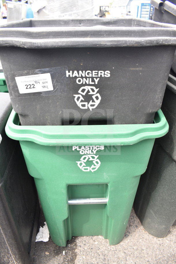Two poly trash cans labeled "Hangers Only" and "Plastics Only," black and green, with recycling symbols. Slightly used condition.