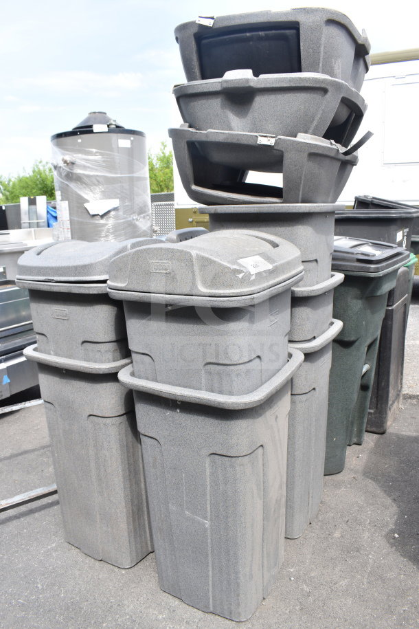 Eight gray poly trash cans, stackable design, used condition, varying heights. Includes lids, some wear visible.