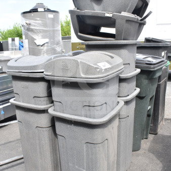 Eight gray poly trash cans, stackable design, used condition, varying heights. Includes lids, some wear visible.