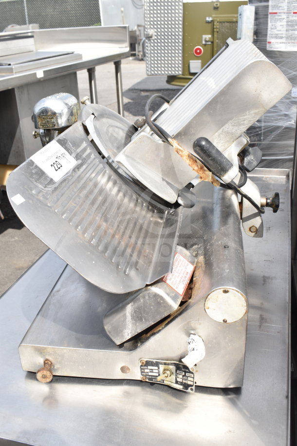 Globe 300 commercial countertop meat slicer with blade sharpener, 115 volts, visible model label, used condition.