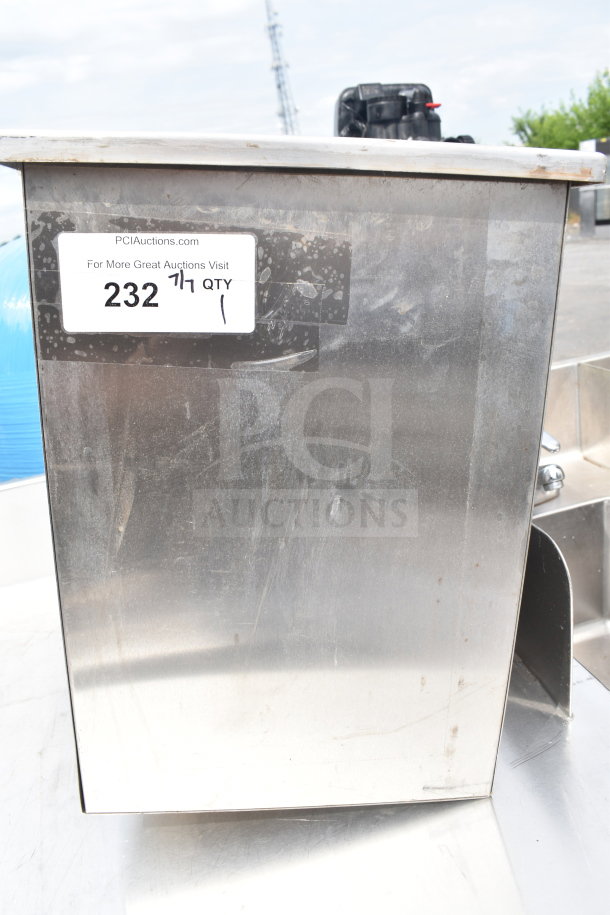 Stainless steel drop-in sink bay with visible label "PCIAuctions.com" and "232 QTY 1", indicating auction lot details.