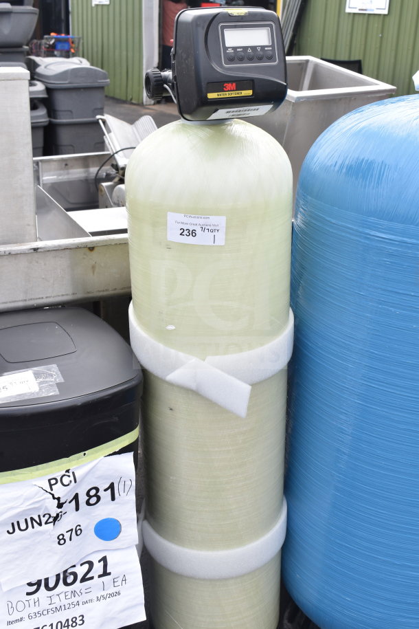 3M water softener tank with digital control unit on top, auction label visible.