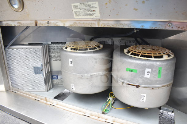 Industrial Best by Broan hood, stainless steel, dual fans, visible labels, signs of wear, ventilation filters included.