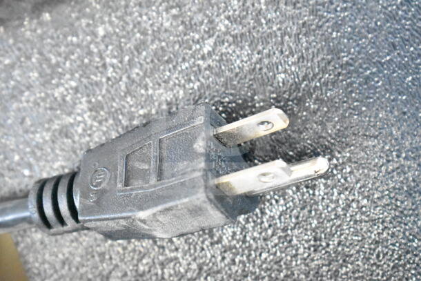 Close-up of a power plug for the 2025 Bunn G3 HD Commercial Coffee Bean Grinder, 120 Volts, 1 Phase.