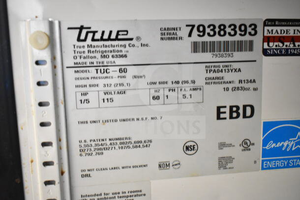True TUC-60 undercounter cooler label showing model, voltage, refrigerant type, and serial number. Energy Star certified.