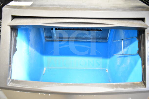 2022 Manitowoc UYF0140A-161B ice machine, blue interior, undercounter model, 115V, 1 phase, excellent condition.