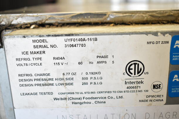 2022 Manitowoc UYF0140A-161B ice machine label with specs: 115V, 1 phase, R404A refrigerant, 6.77 oz charge, ETL certified.