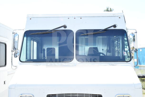 2021 Ford Step Van, white exterior, VIN 1F66F5KN3M0A01361, excellent condition, dual front windshield, side mirrors visible.