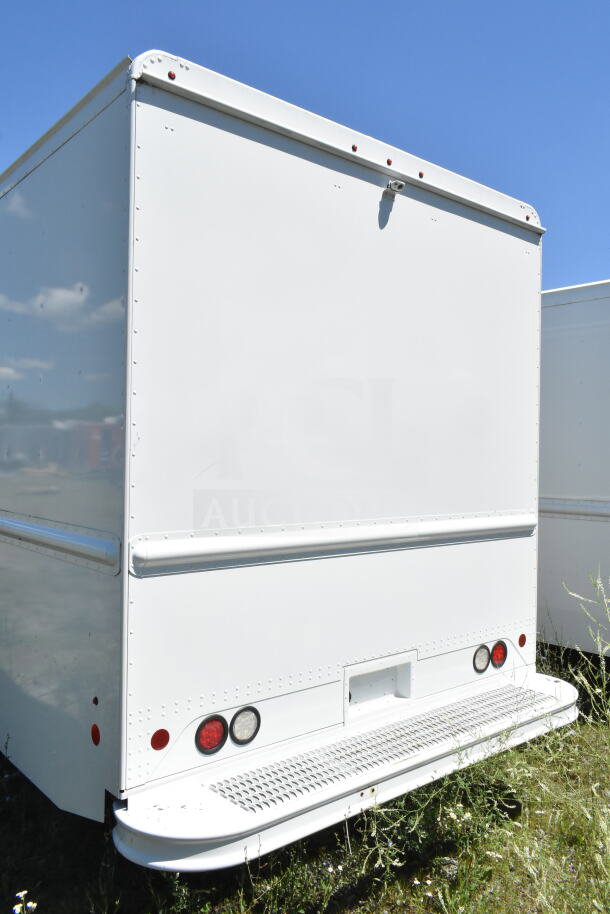 2021 Ford Step Van in excellent condition, white exterior, visible red and white rear lights, VIN 1F66F5KN3M0A01361.