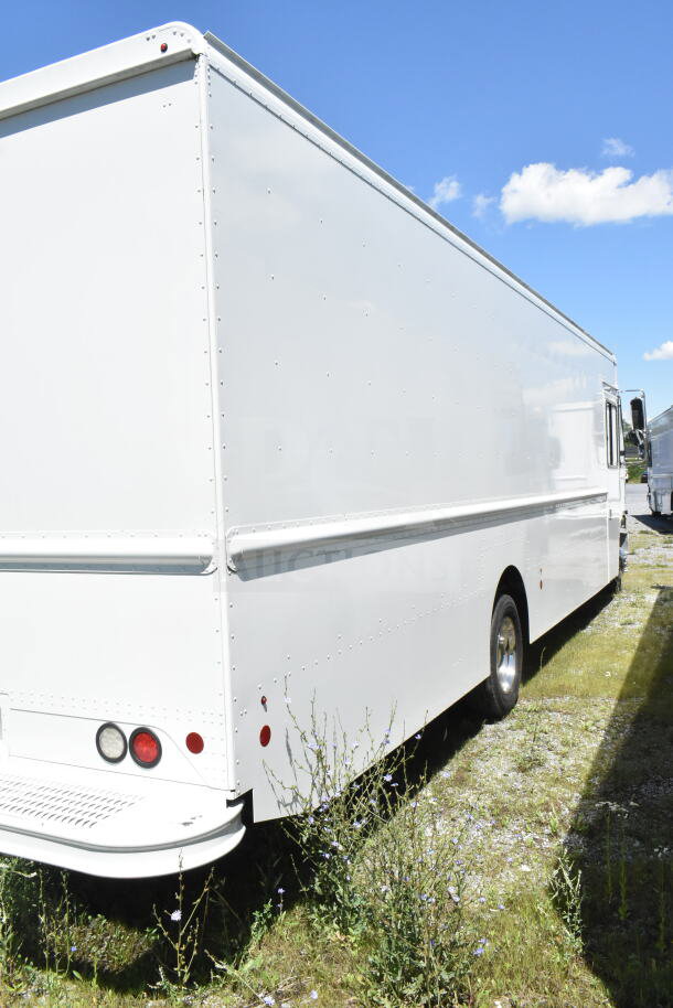 2021 Ford Step Van, VIN 1F66F5KN3M0A01361, white exterior, pristine condition, parked outdoors.