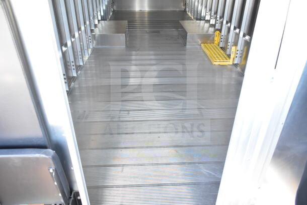 2021 Ford Step Van interior, showing spacious metal-floored cargo area. VIN: 1F66F5KN3M0A01361. Near new condition.