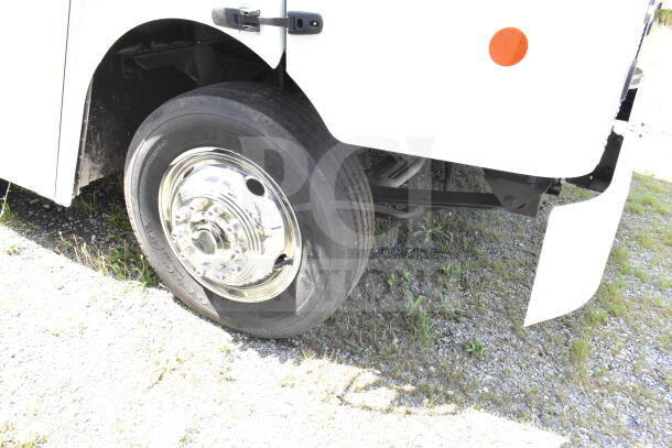 2021 Ford Step Van, visible tire and wheel detail, VIN 1F66F5KN3M0A01361, good condition, white exterior.