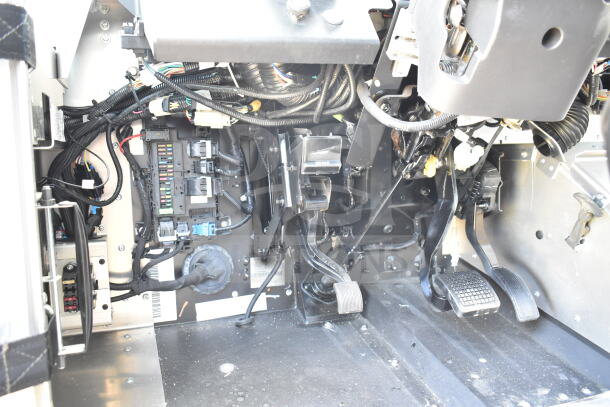 2021 Ford Step Van interior, visible pedal assembly and wiring. VIN 1F66F5KN3M0A01361. Mint condition, detailed view.