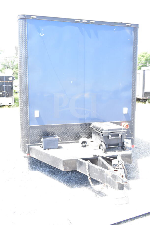 2020 Southern Dimensions 8.5x28 cold beverage/food trailer, featuring insulated blue exterior, tow hitch, and storage box.