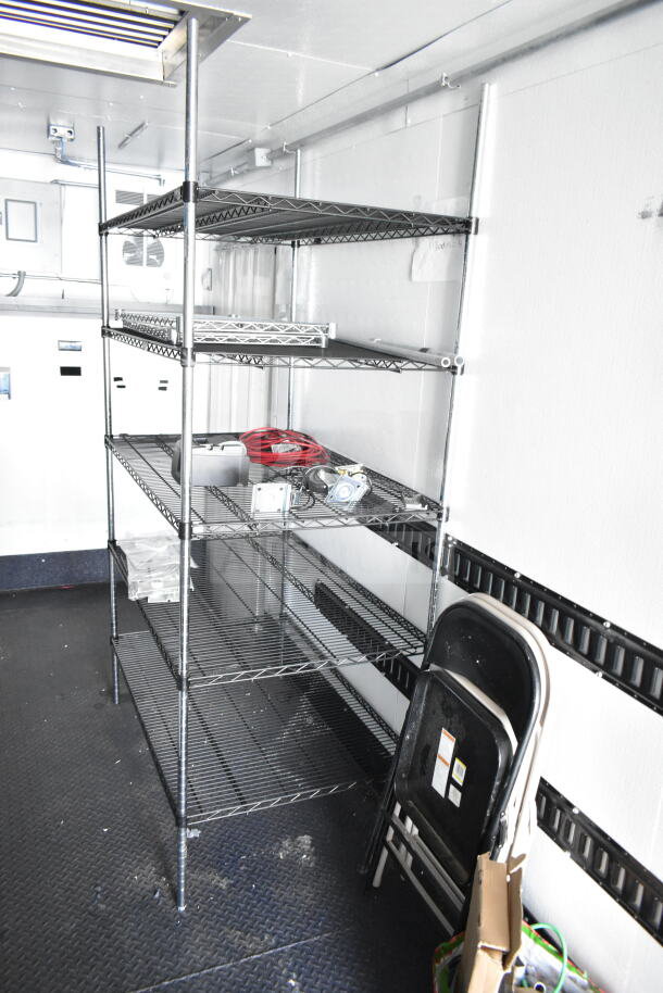 2020 Southern Dimensions 8.5x28 beverage/food trailer interior with shelving and folding chairs. VIN: 4S9S1EK20LW364346.
