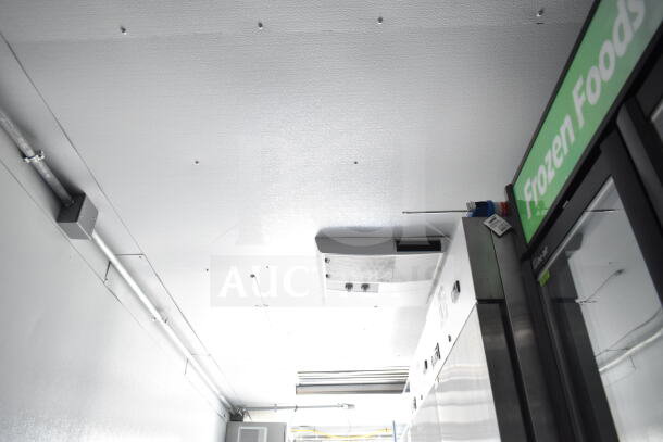 2020 Southern Dimensions 8.5x28 food trailer interior view, featuring refrigerated display marked "Frozen Foods," clean and well-maintained.