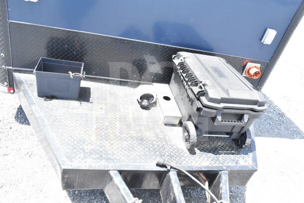 2020 Southern Dimensions 8.5x28 beverage/food trailer hitch area, featuring utility box and power connection.