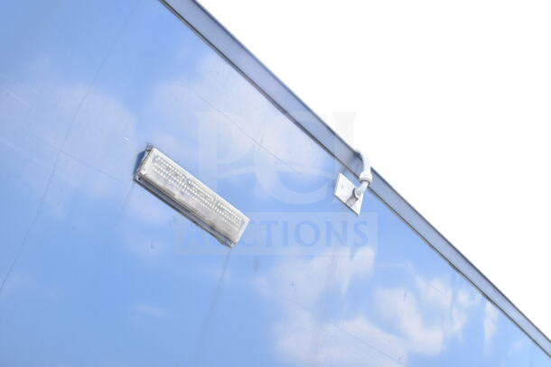 2020 Southern Dimensions 8.5x28 cold beverage/food trailer exterior, blue with mounted light fixture.