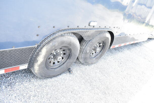 2020 Southern Dimensions 8.5x28 food trailer with black dual axles, showing durable tires and diamond plate detailing.