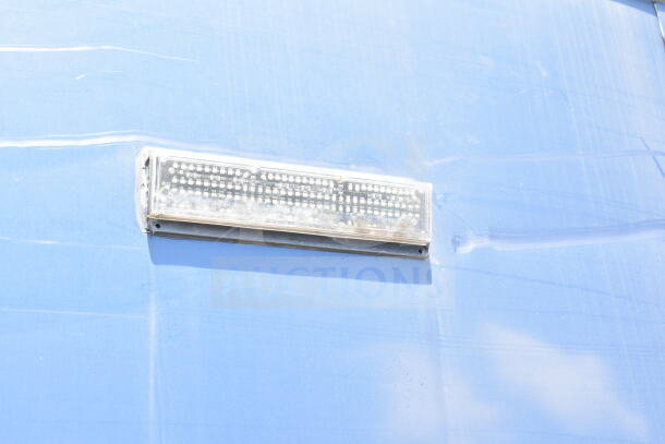 LED light detail on the side of a blue 2020 Southern Dimensions 8.5x28 cold beverage/food trailer.