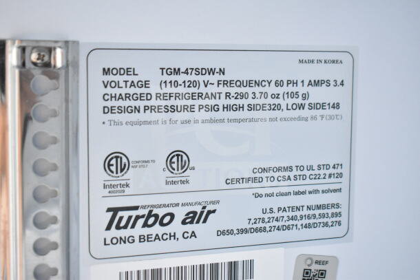 Label on 2020 Southern Dimensions 8.5x28 food trailer's cooler. Model TGM-47SDW-N details include voltage and refrigerant info.