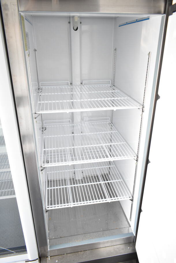2020 Southern Dimensions 8.5x28 beverage trailer interior, showcasing clean metal shelving within a commercial-grade cooler unit.