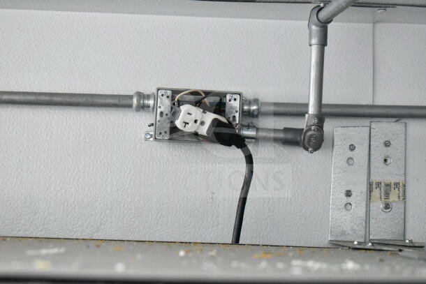 Electrical junction box with outlets and cables inside a 2020 Southern Dimensions food trailer.