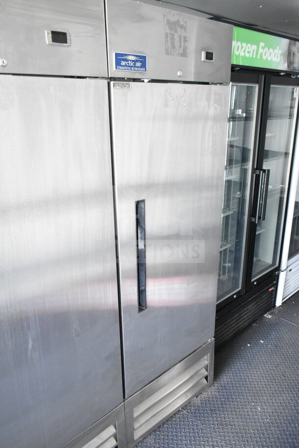 2020 Southern Dimensions 8.5x28 trailer interior, featuring stainless steel Arctic Air commercial refrigerator and coolers.