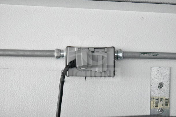 2020 Southern Dimensions 8.5x28 trailer outlet, connected wiring. Durable metal casing, part of electrical setup.