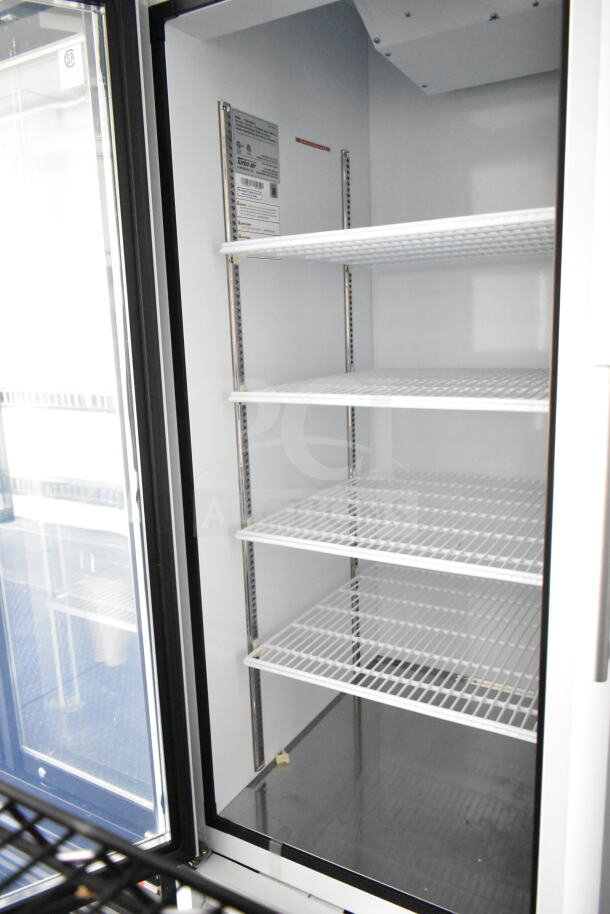 2020 Southern Dimensions 8.5x28 food trailer interior showing spacious wire shelving in cooler. Clean condition.
