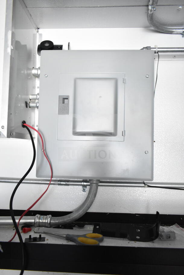 Electrical panel inside a 2020 Southern Dimensions 8.5x28 Beverage/Food Trailer. Visible wiring and tools nearby indicate maintenance access.
