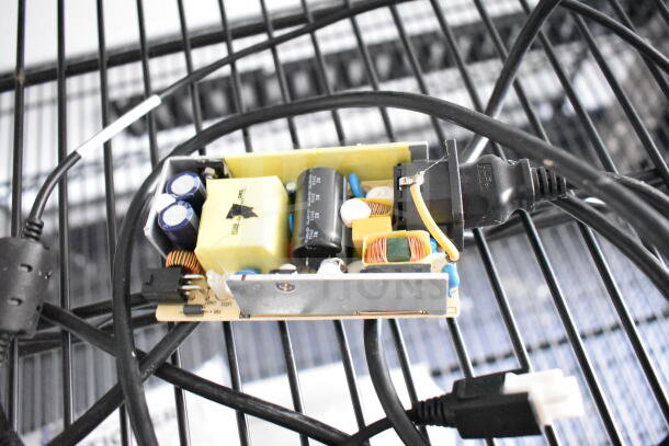 A close-up of electrical components inside the 2020 Southern Dimensions beverage trailer. Wires and circuit board visible.