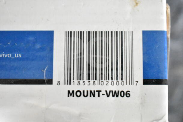 Barcode with the number 818538020007 and marking "MOUNT-VW06" printed on a white and blue label.