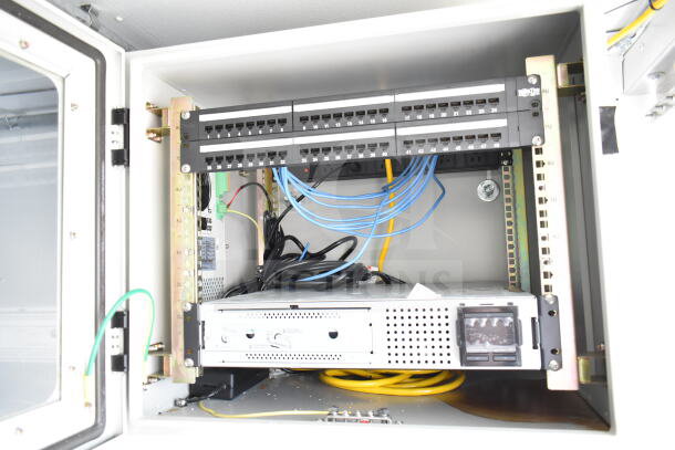 Interior of 2020 Southern Dimensions beverage trailer showing a network panel with cables and server components.