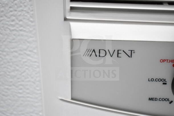 Close-up of ADVENT air conditioning unit control panel with settings for cooling modes.