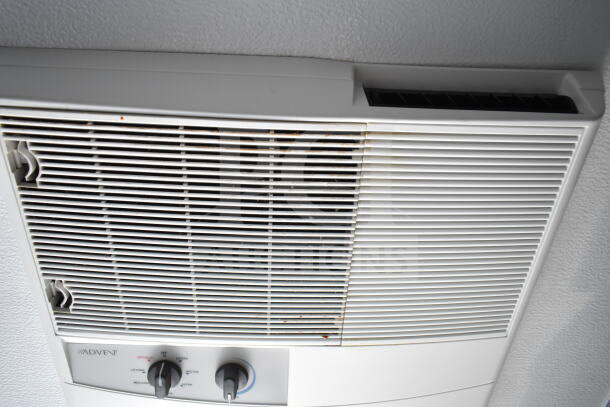 Ceiling-mounted Advent air vent in 2020 Southern Dimensions 8.5x28 trailer, showing controls and fan settings.