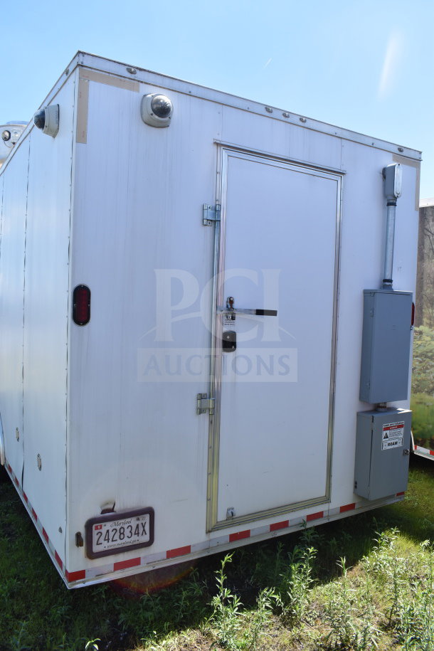 2021 Diamond Cargo 8.5x24 food trailer, fully outfitted. Visible VIN 53NBE2421M1089857, rear view, good condition.