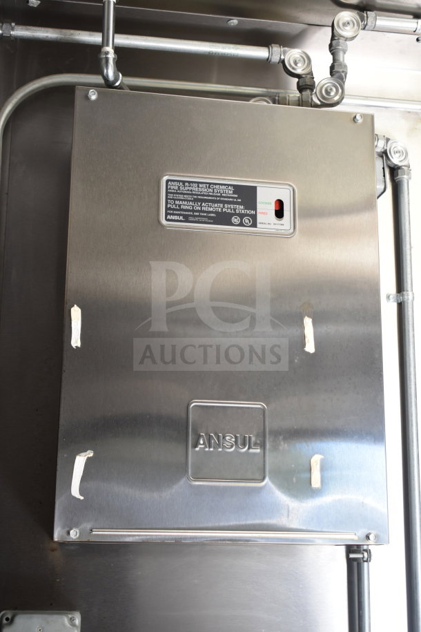 Ansul R-102 wet chemical fire suppression system in 2021 Diamond Cargo food trailer, with visible label and metal casing.