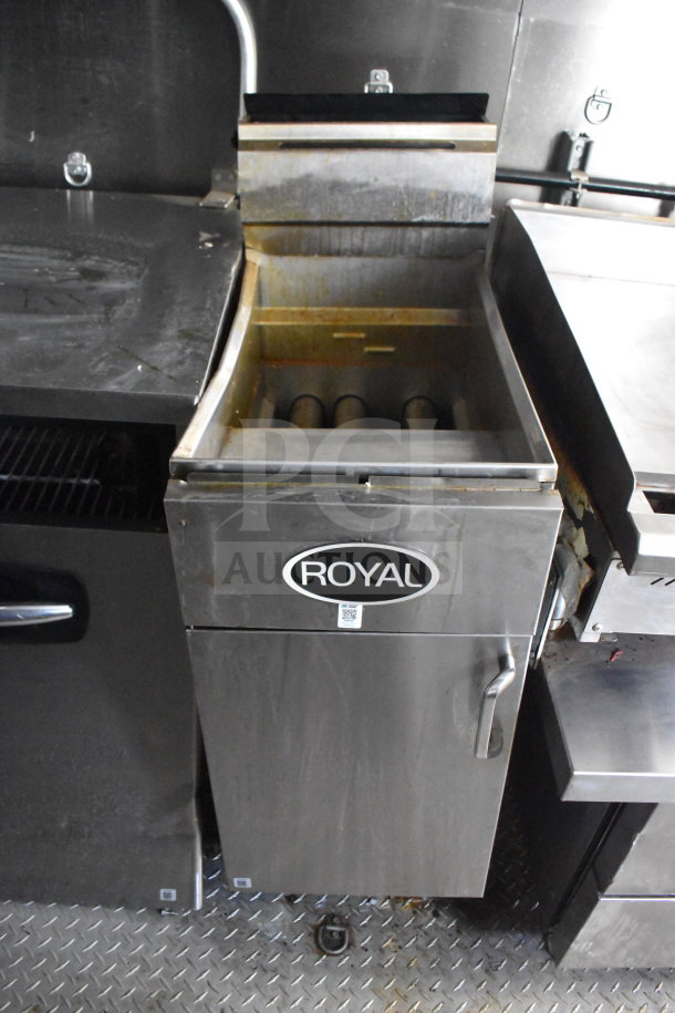 Royal brand fryer inside a 2021 Diamond Cargo 8.5x24 food trailer, featuring grease hood and fire suppression system.