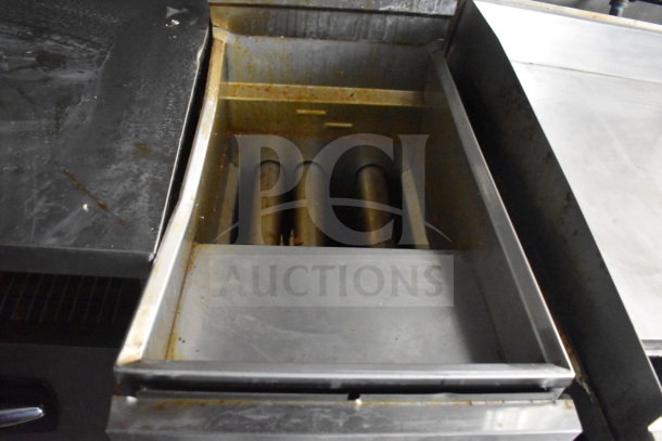 2021 Diamond Cargo 8.5x24 food trailer interior showing cooking equipment, grease hood, and fire suppression system.