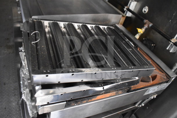 2021 Diamond Cargo food trailer, featuring a griddle, grease hood, and fire suppression system. Clean interior.