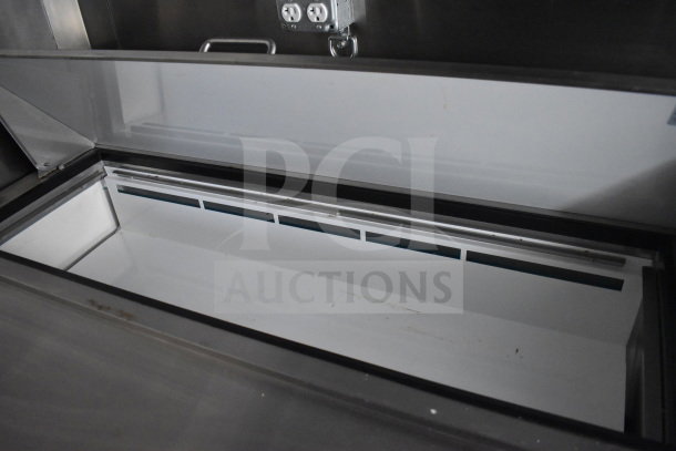 2021 Diamond Cargo 8.5x24 food trailer interior showing stainless steel refrigeration unit.