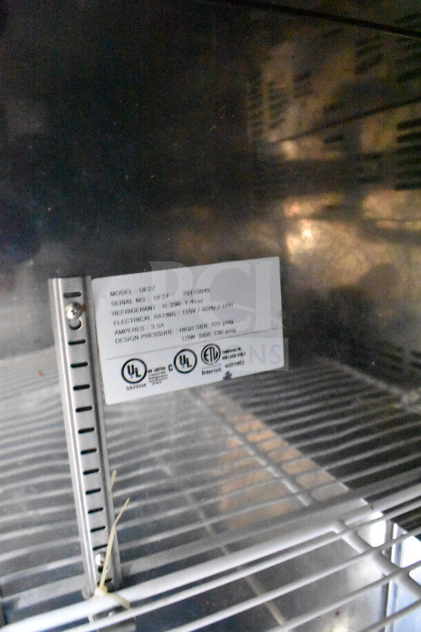 2021 Diamond Cargo 8.5x24 food trailer tag, model UF27, R-290 refrigerant, 115V, 3.5A, UL and Intertek certified.