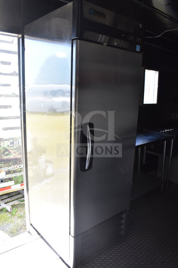 2021 Diamond Cargo 8.5x24 food trailer interior, featuring commercial-grade stainless steel refrigerator, new condition.