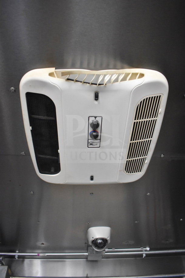 Interior of a 2021 Diamond Cargo food trailer showing a white ceiling-mounted climate control unit with adjustable settings knob.